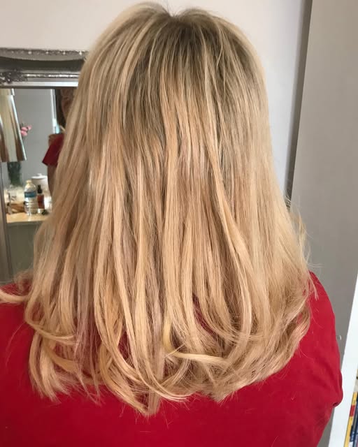 Golden blonde result after extensions